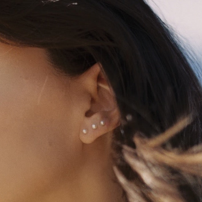 Pequeños pendientes de perlas